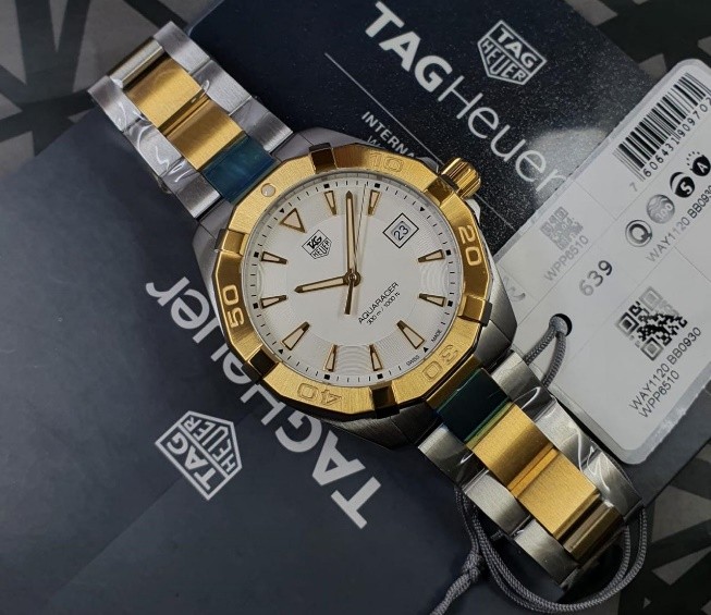 5 TAG Heuer Aquaracer 300M Quartz 41mm Steel & Gold - Image 1
